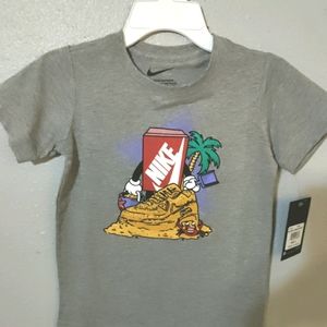 Nike Grey Shirt With Nike Shoe Box Building Sandy